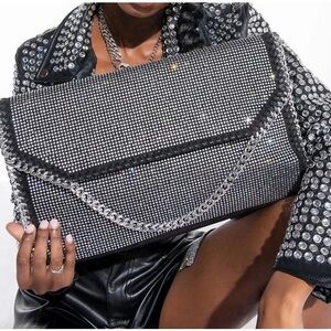AKIRA Oversized clutch with strap